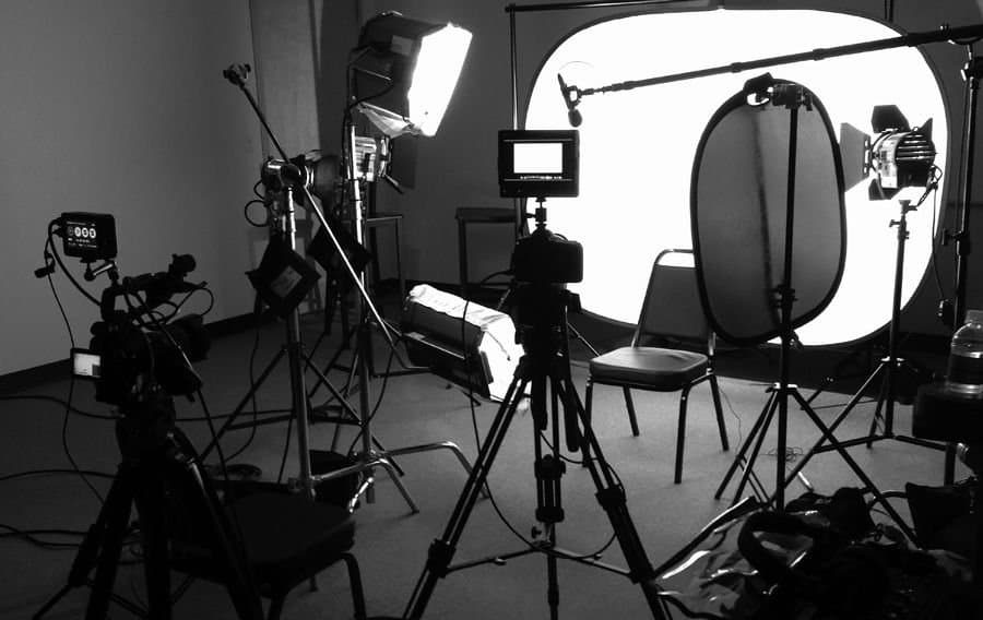 On set with camera crew
